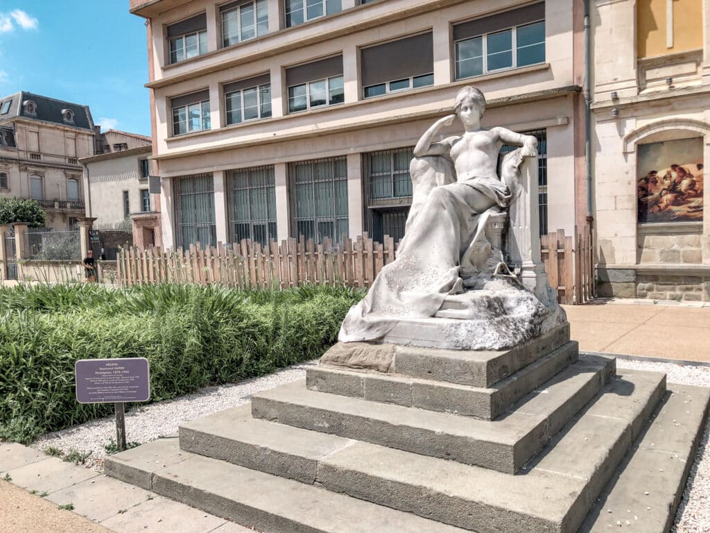 A statue of a woman in Carcassonne