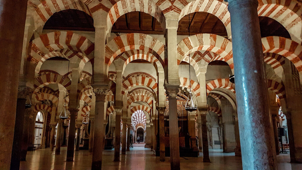 The interior of the Cathedral of Cordoba with its striped arches in row after row making it seem infinite